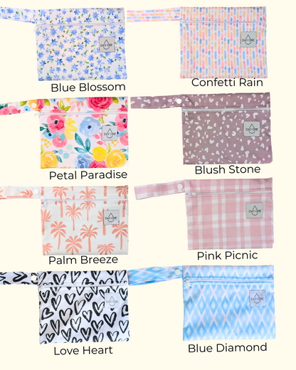 8 reusable wet bag designs to choose from: blue blossom, confetti rain, petal paradise, blush stone, palm breeze, pink picnic, love heart, and blue diamond. perfect for extra storage in your period kit.